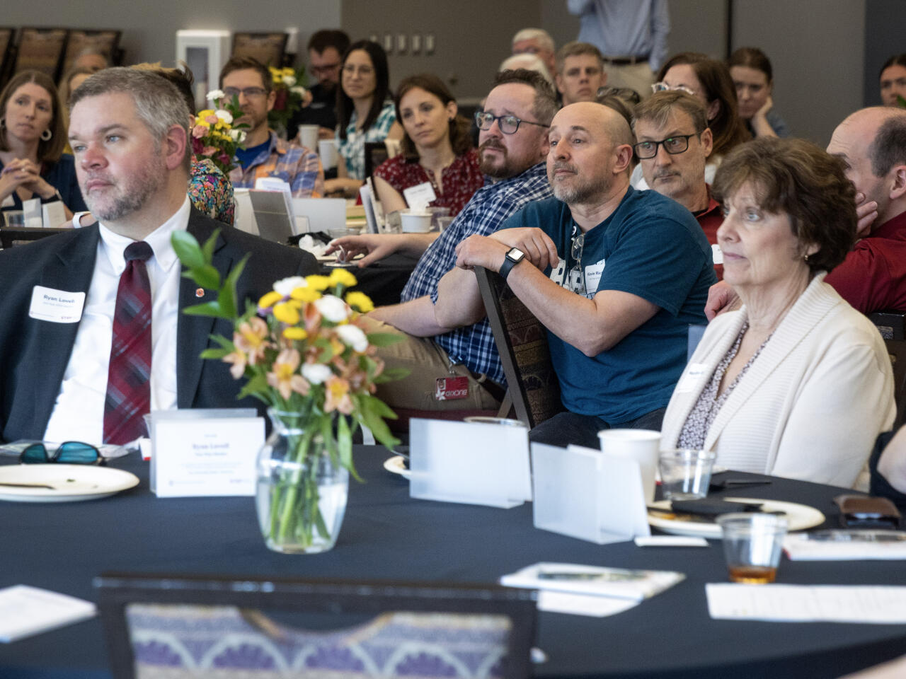 Faculty Mentors and campus partners listening to the program and Leadership Lecture