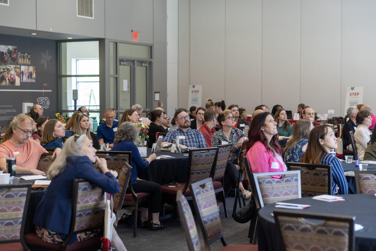 Listening to the lecture.