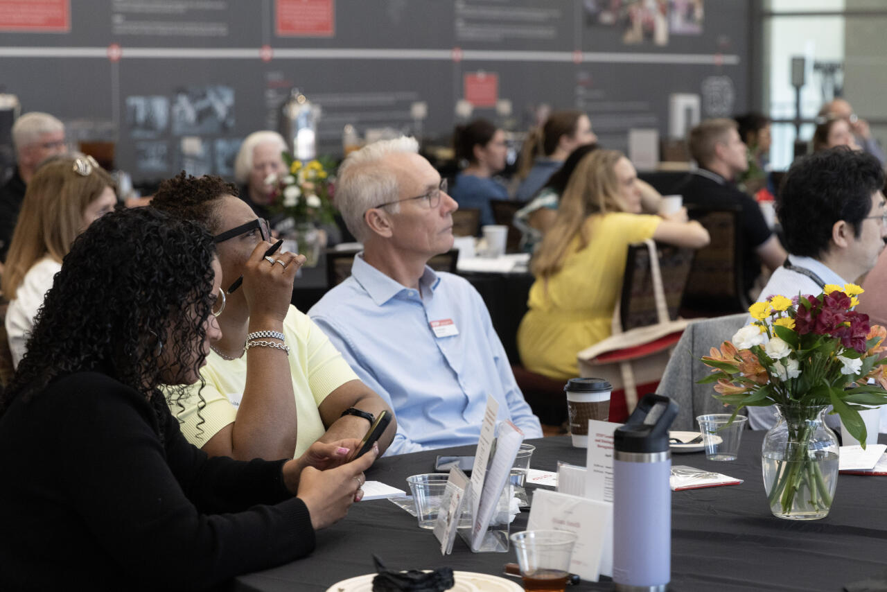 Listening to the lecture.