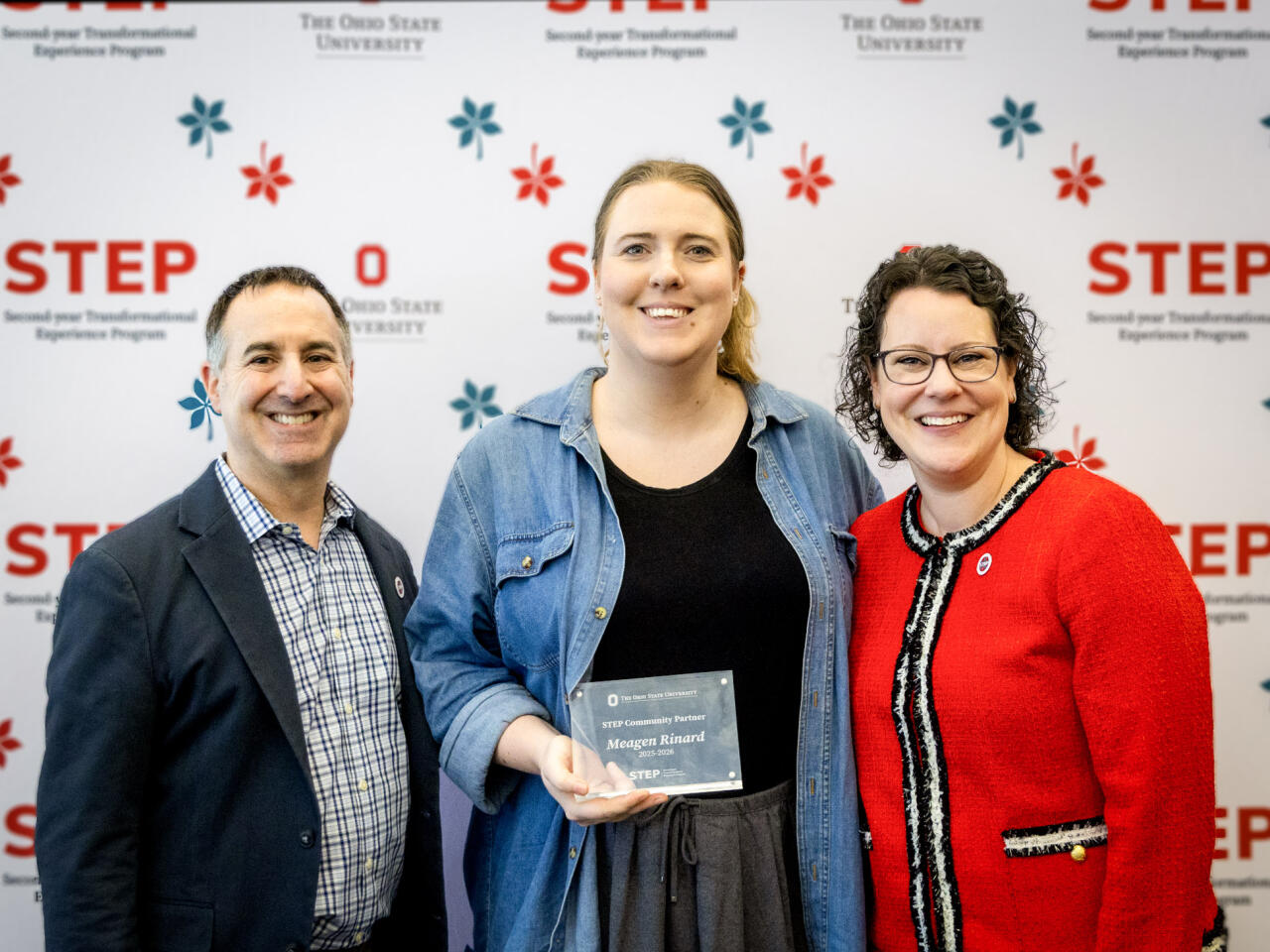 Meagen Rinard receives her STEP Community Partner award.